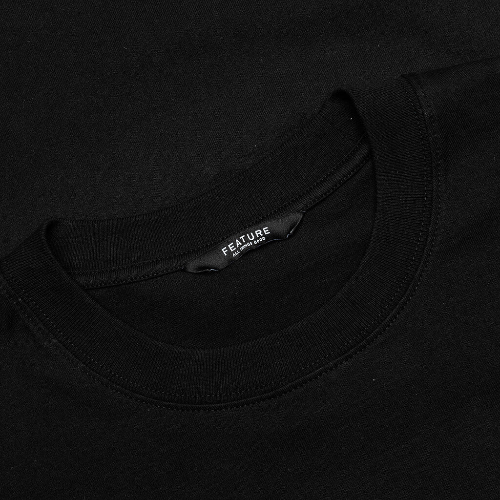 Feature x Designercon James Tee Black