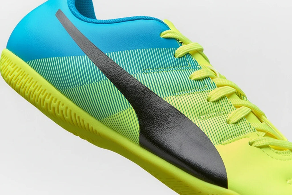 PUMA Evopower 43 IT JR Youth Indoor Soccer Shoes Safety Yellow Black Atomic Blue